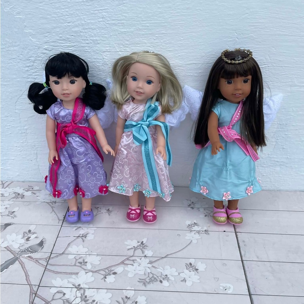 American Girl Angel Dolls with Pink, Blue, and Purple Dresses